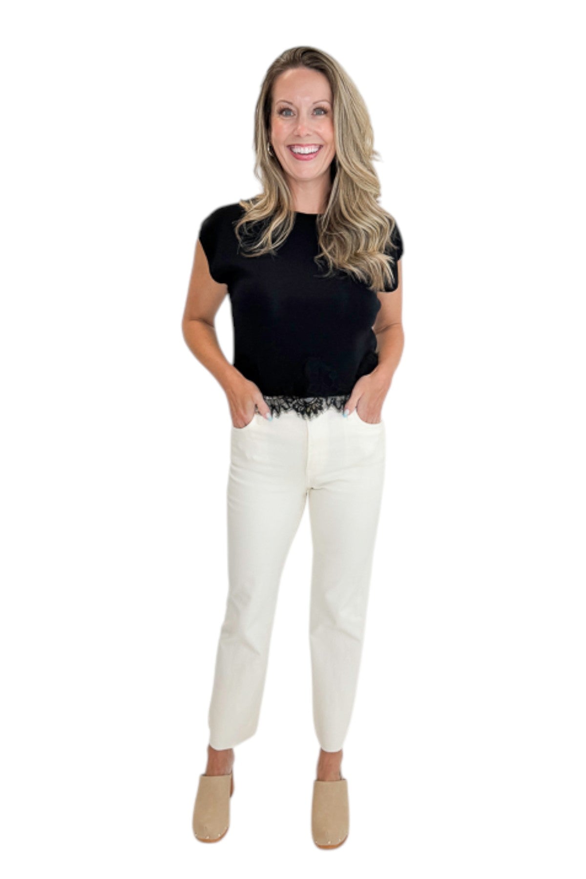 Front view of woman wearing Swagger Boutique’s Black Short Sleeve Lace Trim Top with jeans against white studio background.