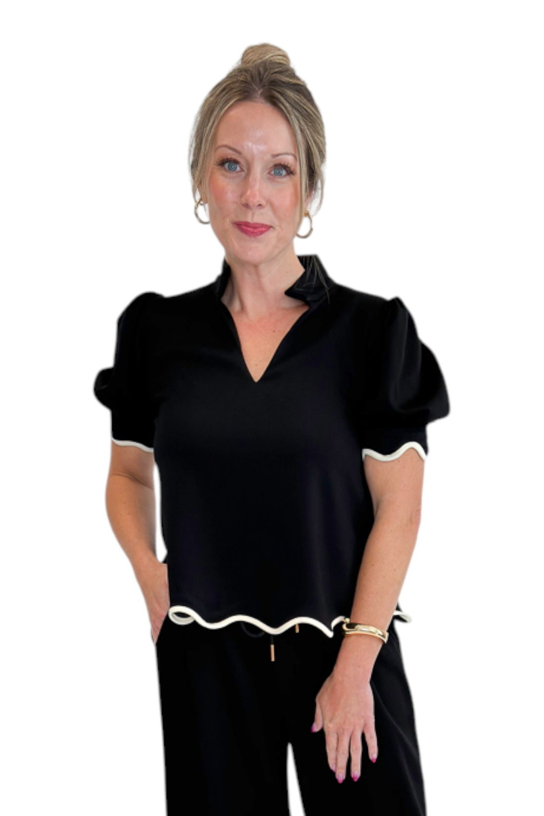 Front view of woman wearing Swagger Boutique’s Black &amp; Cream Scalloped Top by Entro with matching Lounge Pants against white studio background.