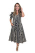 Front view of woman wearing Swagger Boutique’s Black & Cream Striped Midi Dress with sandals against white studio background.