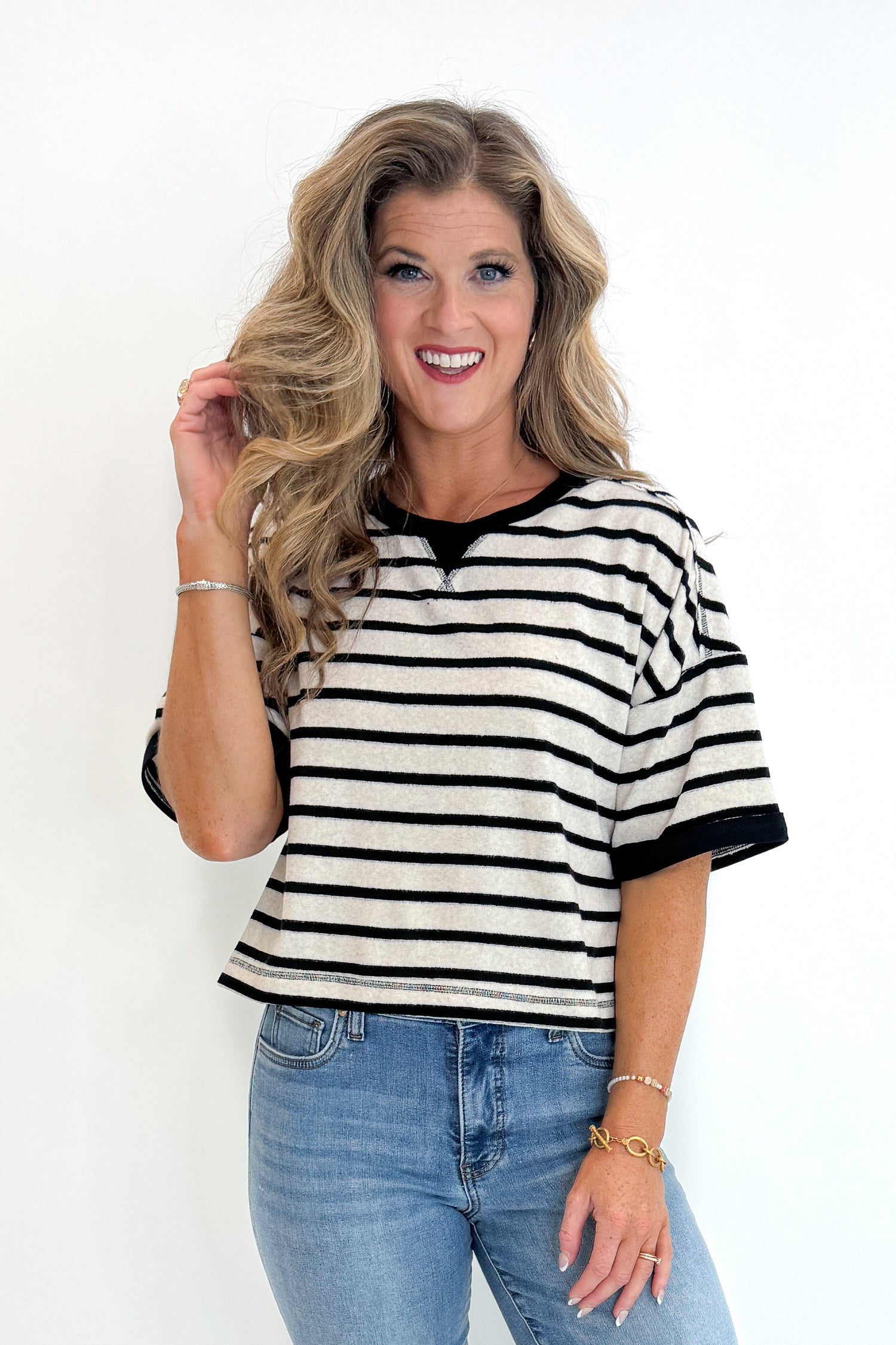 Front view of woman wearing Swagger Boutique&