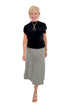 Front view of woman wearing Swagger Boutique’s Black Shirred Cap Sleeve Sweater with Black & White Plaid Midi Skirt against white studio background.