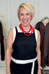 Front detail view of woman wearing Swagger Boutique’s Black & White Wrap Skort &  Square Neck Tank by Entro against white studio background. 