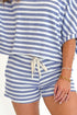 Front view of woman wearing Swagger Boutique’s Blue Striped Terry Cloth Shorts with matching Blue Striped Terry Cloth Top against white studio background.