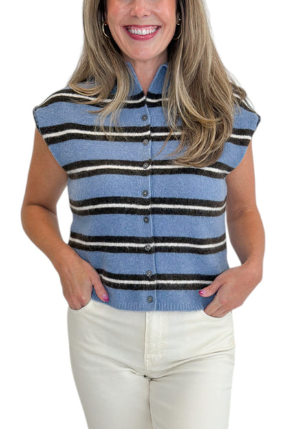 Front detail view of woman wearing Swagger Boutique’s Blue &amp; Brown Striped Sleeveless Sweater by Entro with jeans against white studio background.
