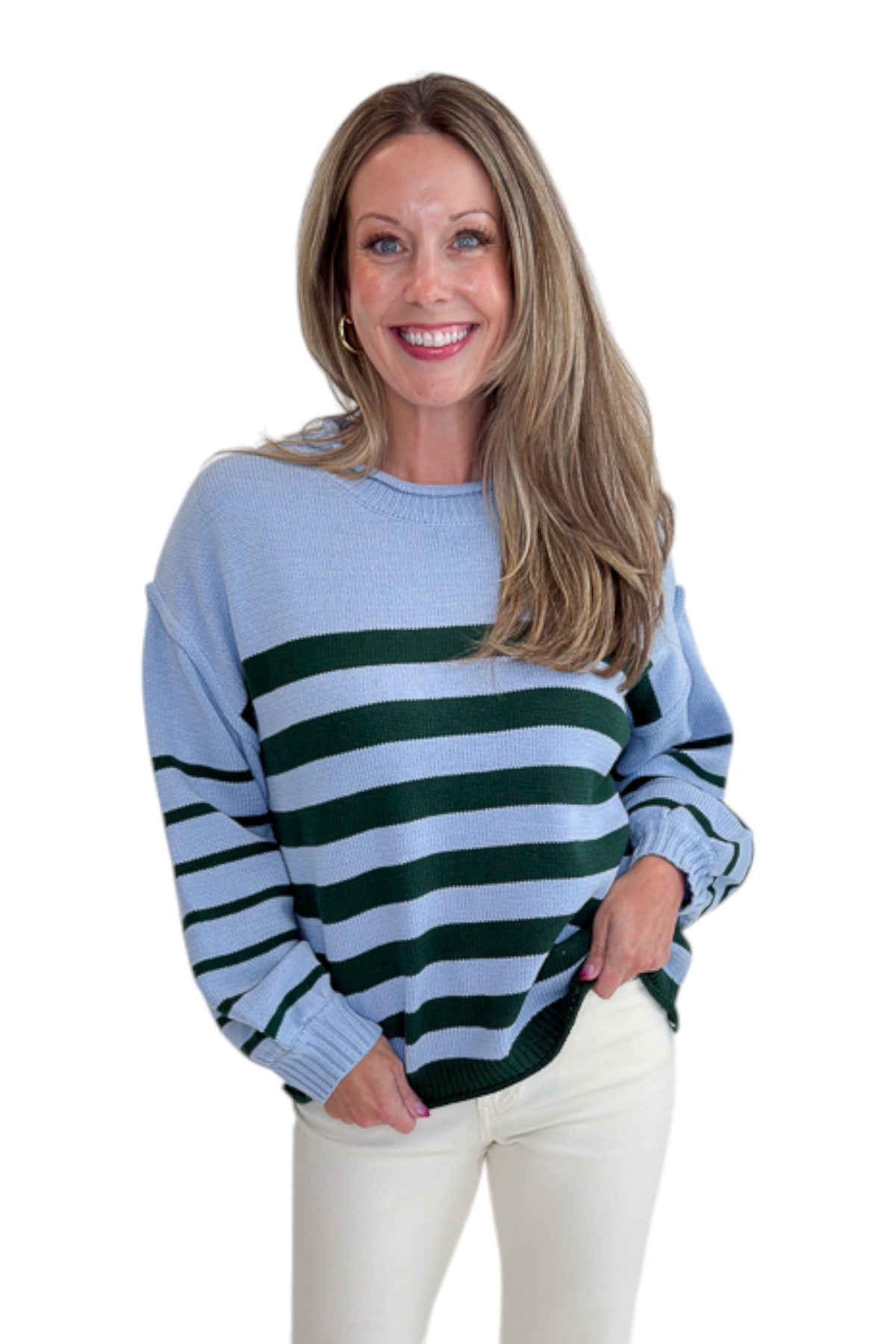 Front view of woman wearing Swagger Boutique’s Blue &amp; Green Striped Sweater with jeans against white studio background.