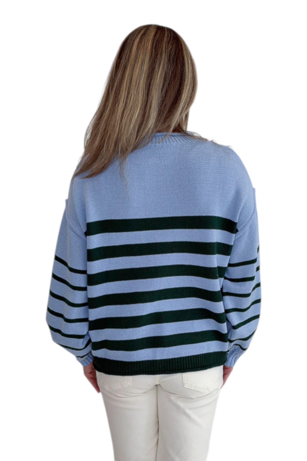 Back view of woman wearing Swagger Boutique’s Blue &amp; Green Striped Sweater with jeans against white studio background.