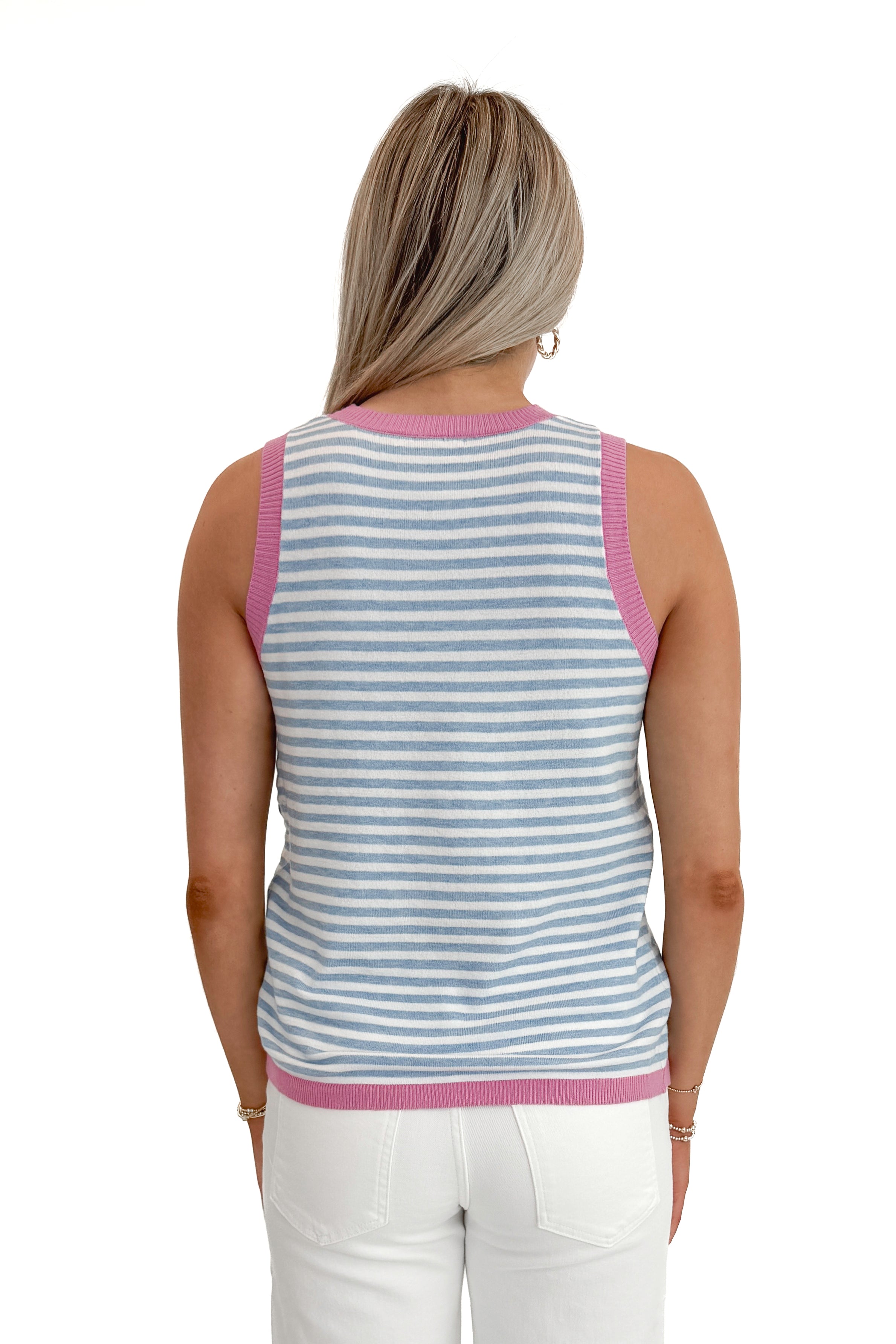 Back view of woman wearing Blue &amp; Lilac Striped Sweater Tank with jeans against white studio background.