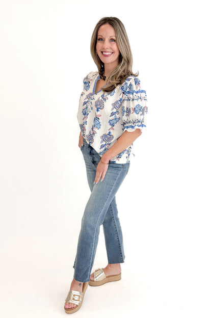 Front view of woman wearing Blue &amp; Multi Printed Lace Detail Top with jeans against white studio background.