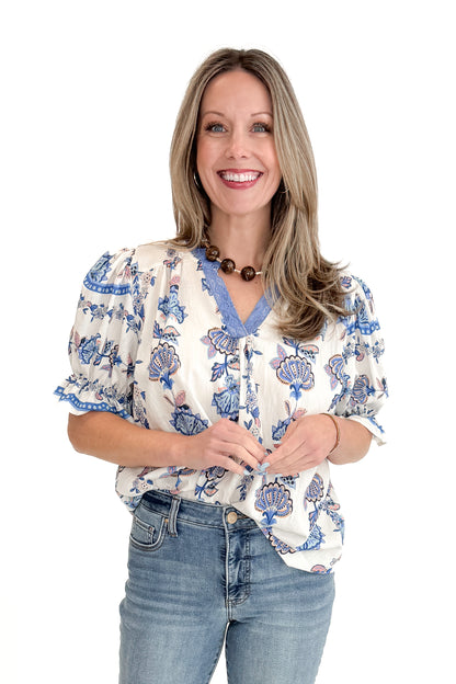 Front view of woman wearing Blue &amp; Multi Printed Lace Detail Top with jeans against white studio background.