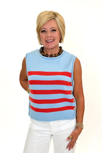 Front view of woman wearing Swagger Boutique’s Blue &amp; Red Striped Sleeveless Sweater by Entro with jeans against white studio background.