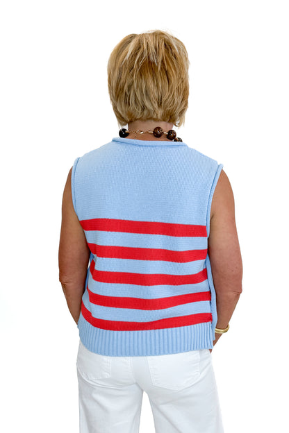 Back view of woman wearing Swagger Boutique’s Blue &amp; Red Striped Sleeveless Sweater by Entro with jeans against white studio background.