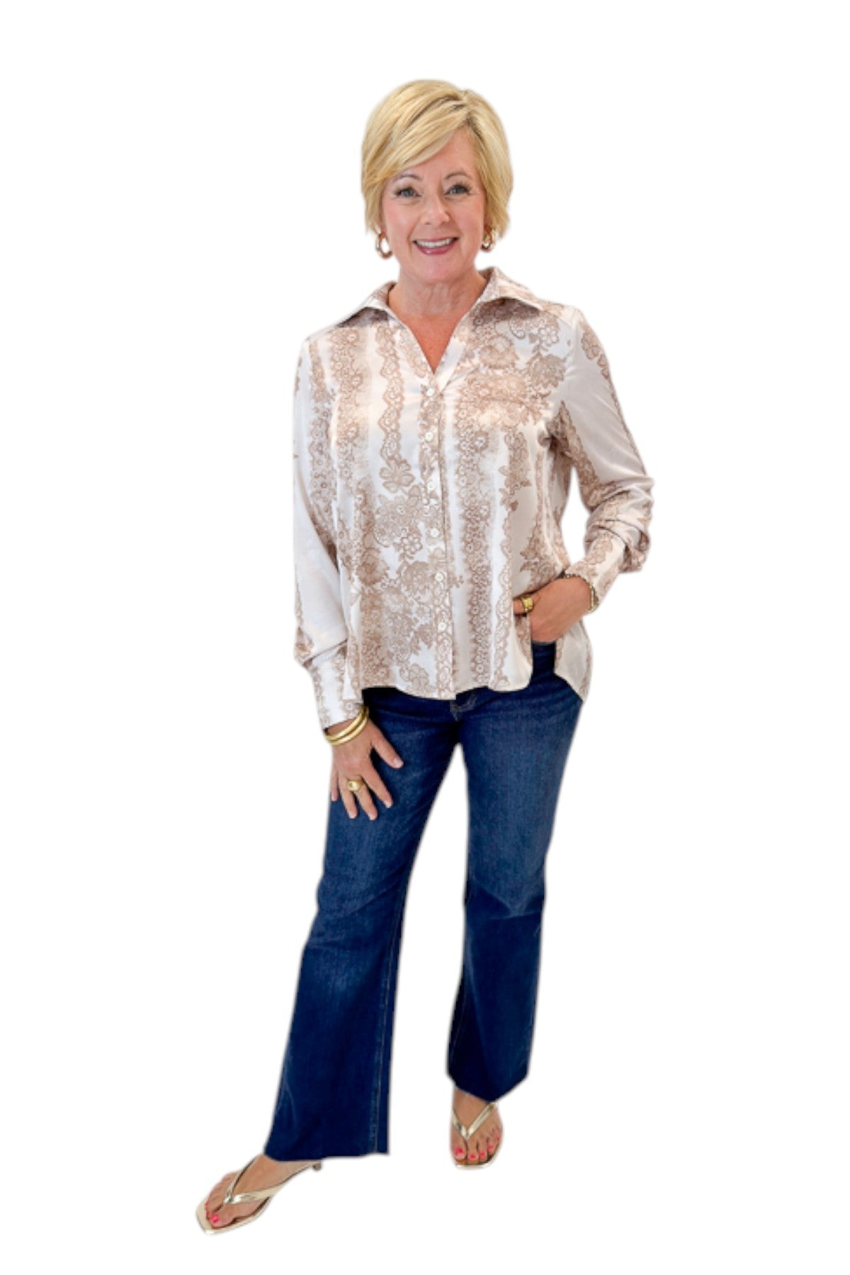 Front view of woman wearing Swagger Boutique’s Blush &amp; Tan Lace Print Button Up Top with jeans against white studio background.