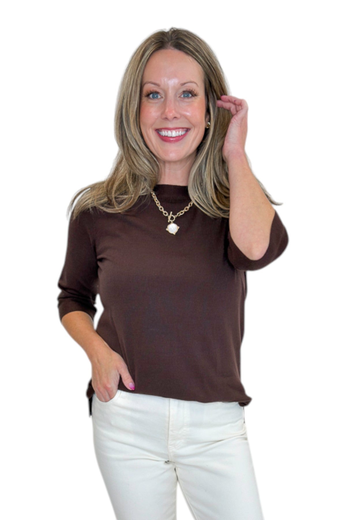 Front view of woman wearing Swagger Boutique’s Brown Lightweight Half Sleeve Sweater with jeans against white studio background.