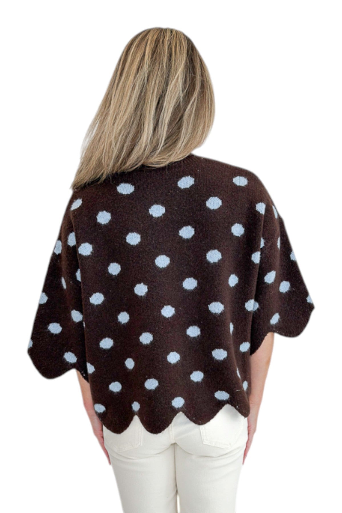 Back view of woman wearing Swagger Boutique’s Brown Polka Dot Short Sleeve Sweater by Entro with jeans against white studio background.