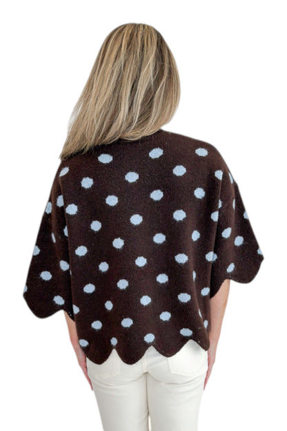 Back view of woman wearing Swagger Boutique’s Brown Polka Dot Short Sleeve Sweater by Entro with jeans against white studio background.