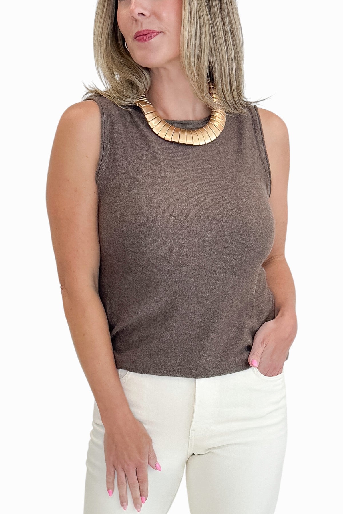 Front detail view of woman wearing Swagger Boutique’s Brown Sweater Tank with jeans against white studio background.