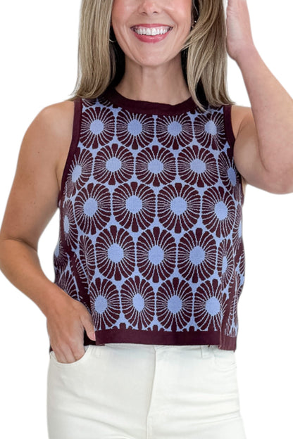 Front detail view of woman wearing Swagger Boutique’s Brown &amp; Blue Floral Tank with jeans against white studio background.