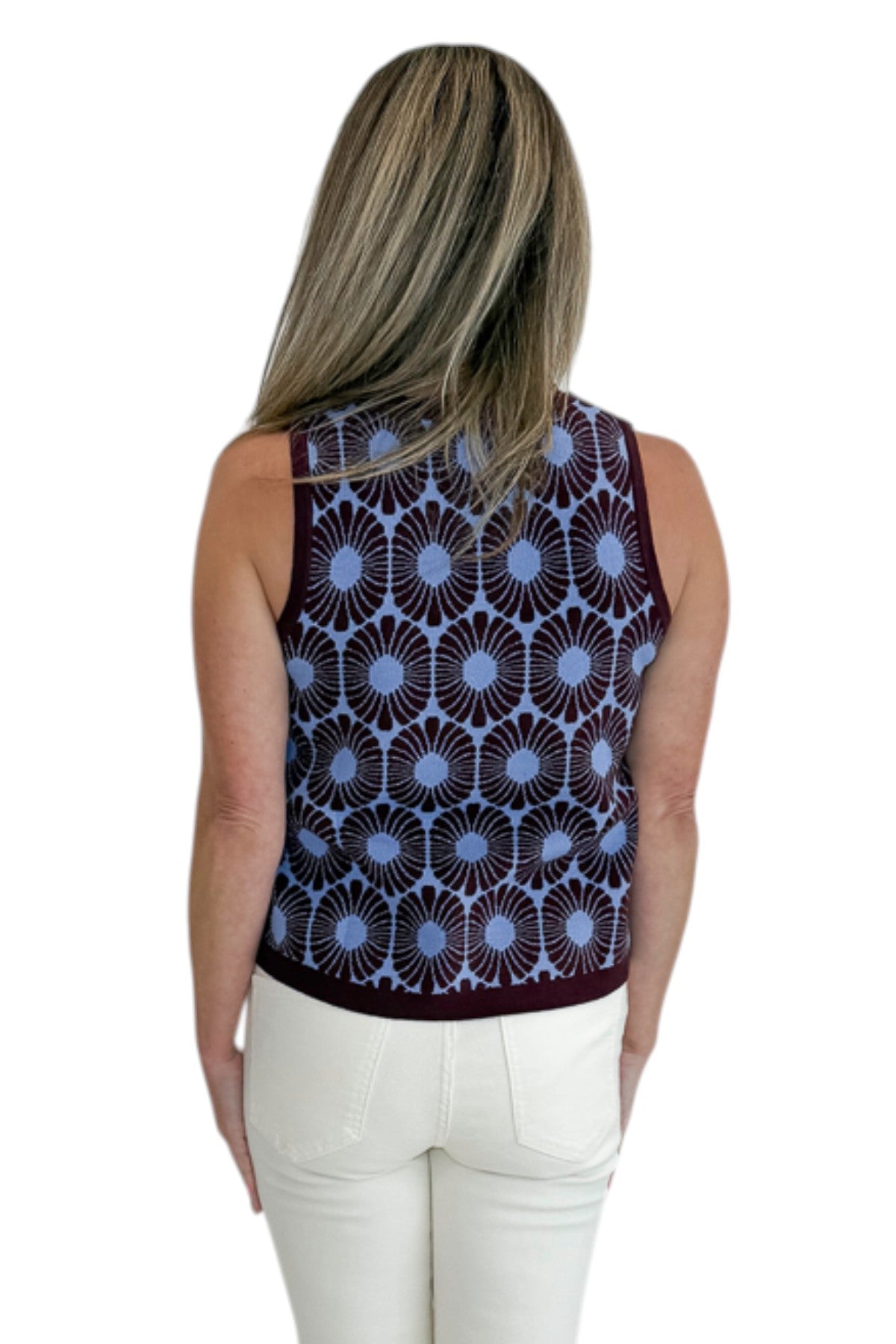 Back view of woman wearing Swagger Boutique’s Brown &amp; Blue Floral Tank with jeans against white studio background.