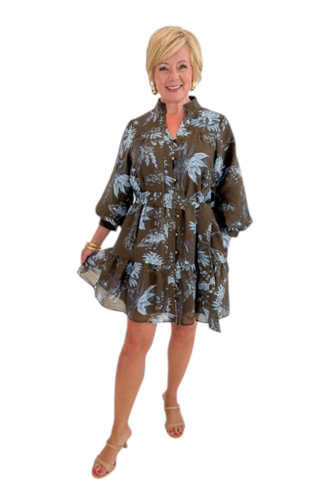 Front view of woman wearing Swagger Boutique’s Brown &amp; Blue Floral Tie Waist Mini Dress against white studio background.