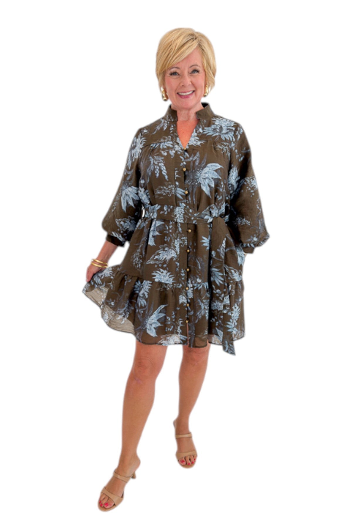 Front view of woman wearing Swagger Boutique’s Brown &amp; Blue Floral Tie Waist Mini Dress against white studio background.