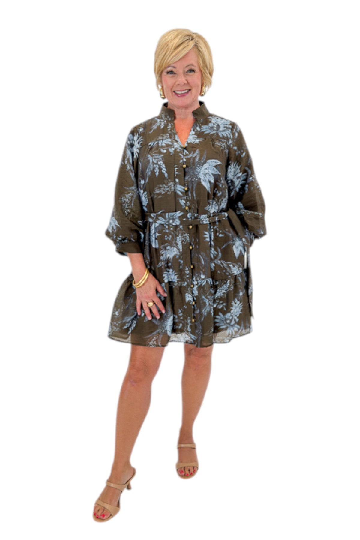 Front view of woman wearing Swagger Boutique’s Brown &amp; Blue Floral Tie Waist Mini Dress against white studio background.