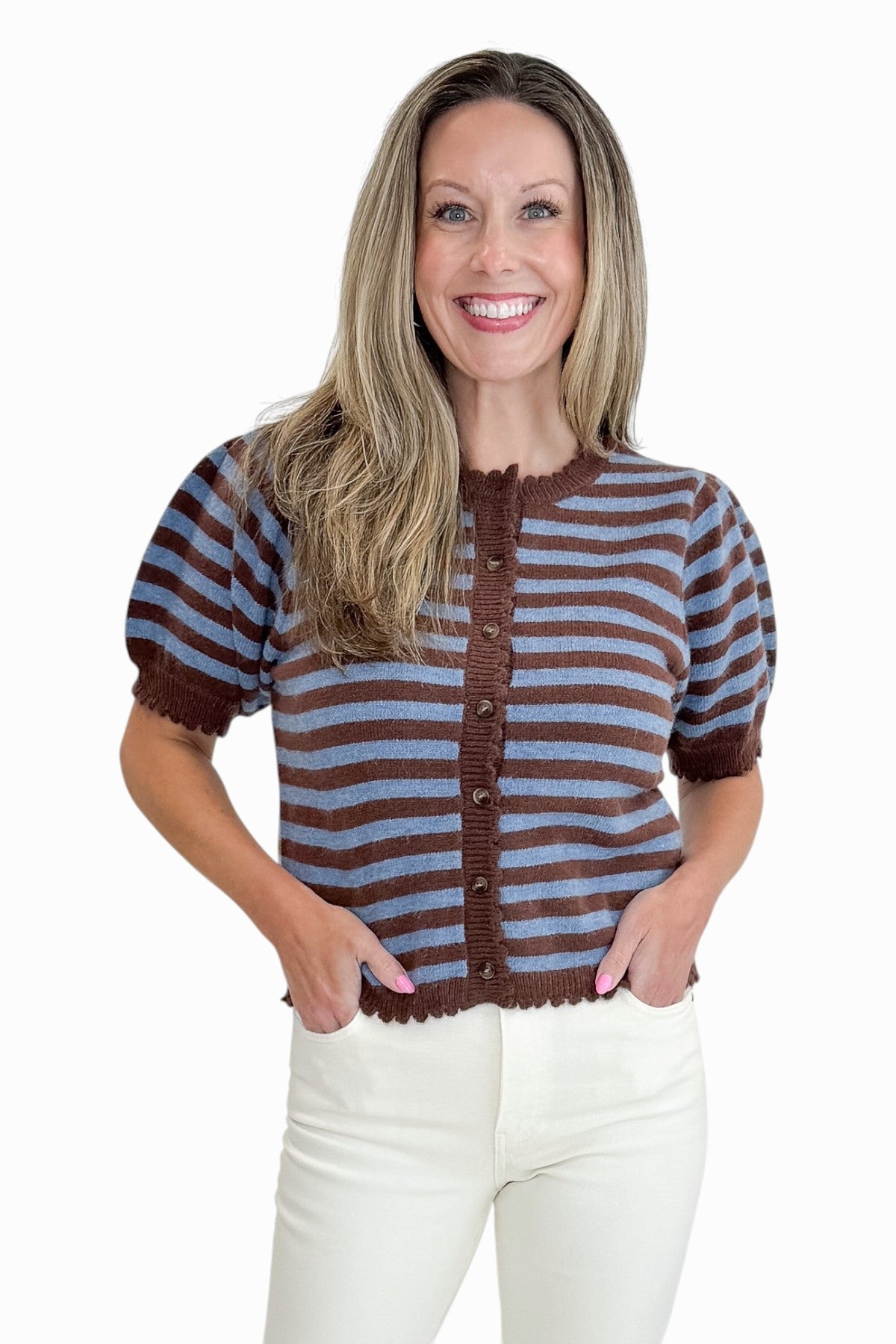 Front view of woman wearing Swagger Boutique’s Brown &amp; Blue Stripe Short Sleeve Cardigan by Entro with jeans against white studio background.