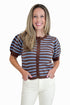 Front view of woman wearing Swagger Boutique’s Brown & Blue Stripe Short Sleeve Cardigan by Entro with jeans against white studio background.