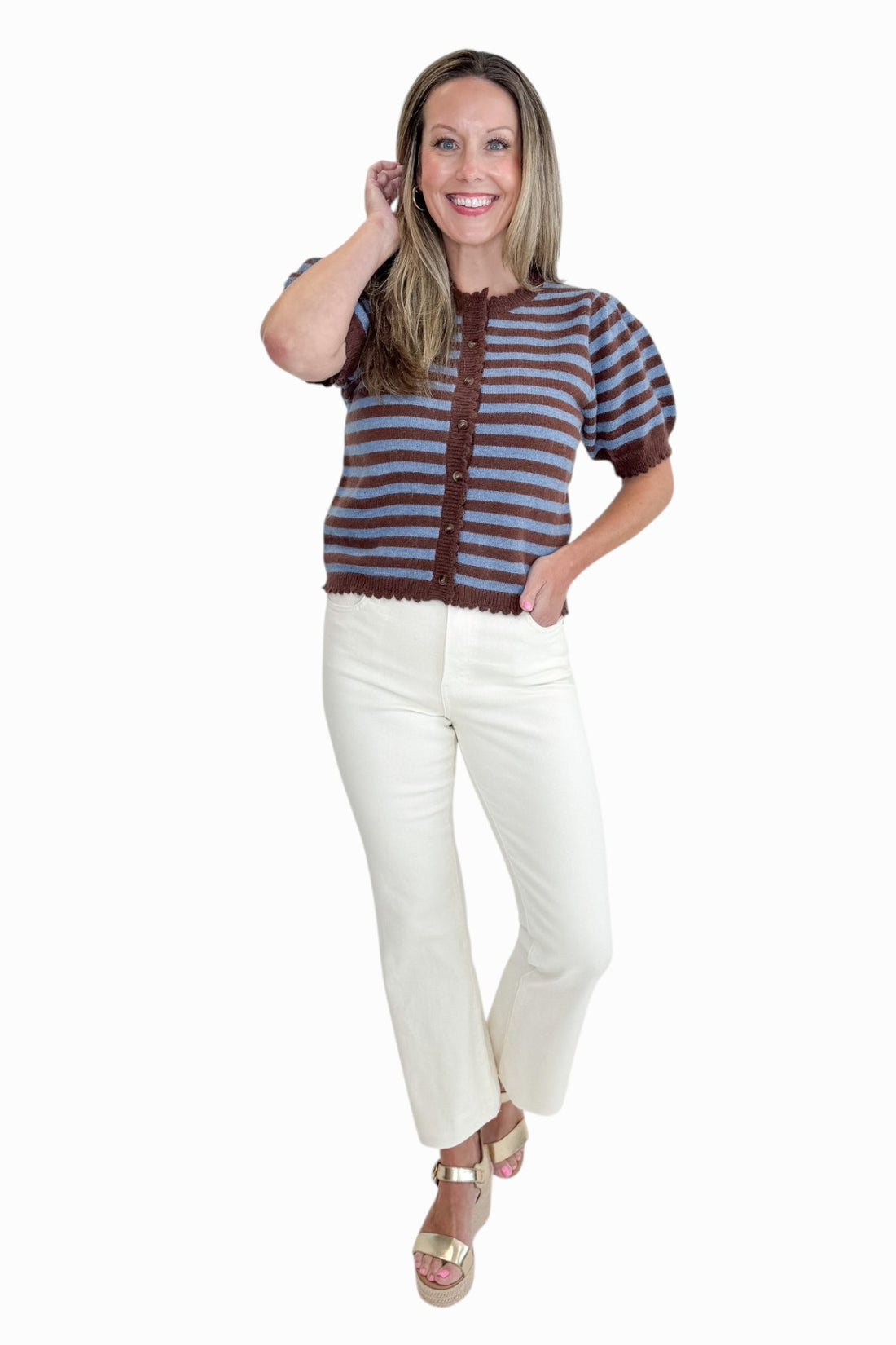Front view of woman wearing Swagger Boutique’s Brown &amp; Blue Stripe Short Sleeve Cardigan by Entro with jeans against white studio background.