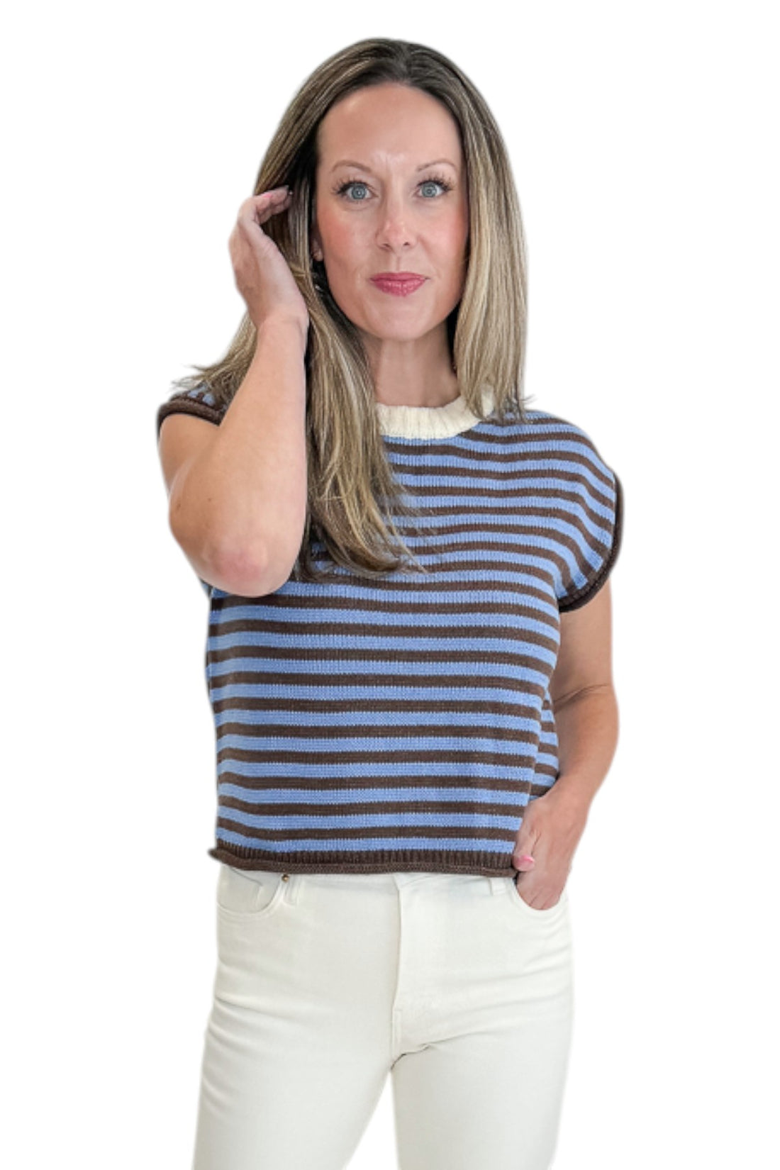 Front view of woman wearing Swagger Boutique’s Brown &amp; Blue Striped Sleeveless Sweater by Entro with jeans against white studio background.