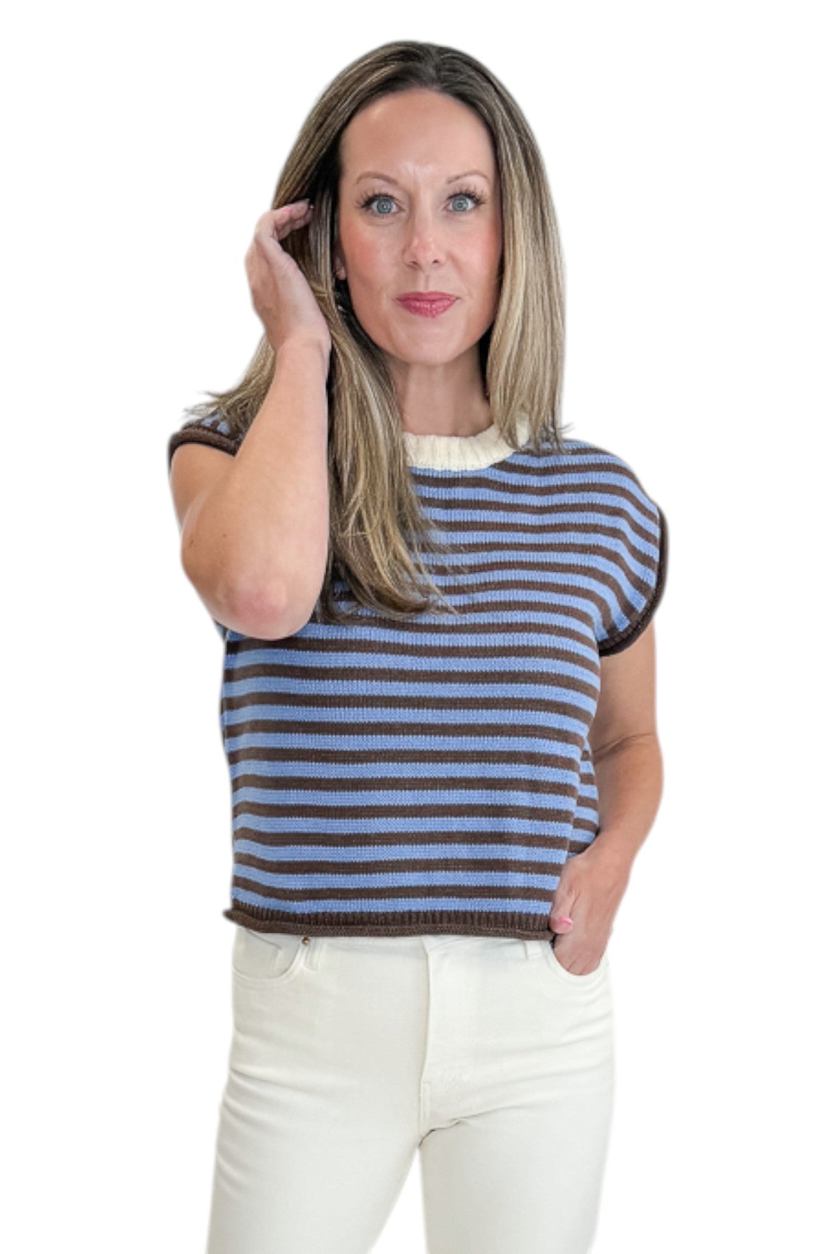 Front view of woman wearing Swagger Boutique’s Brown &amp; Blue Striped Sleeveless Sweater by Entro with jeans against white studio background.