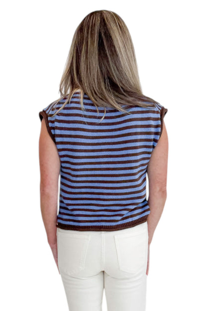 Back view of woman wearing Swagger Boutique’s Brown &amp; Blue Striped Sleeveless Sweater by Entro with jeans against white studio background.
