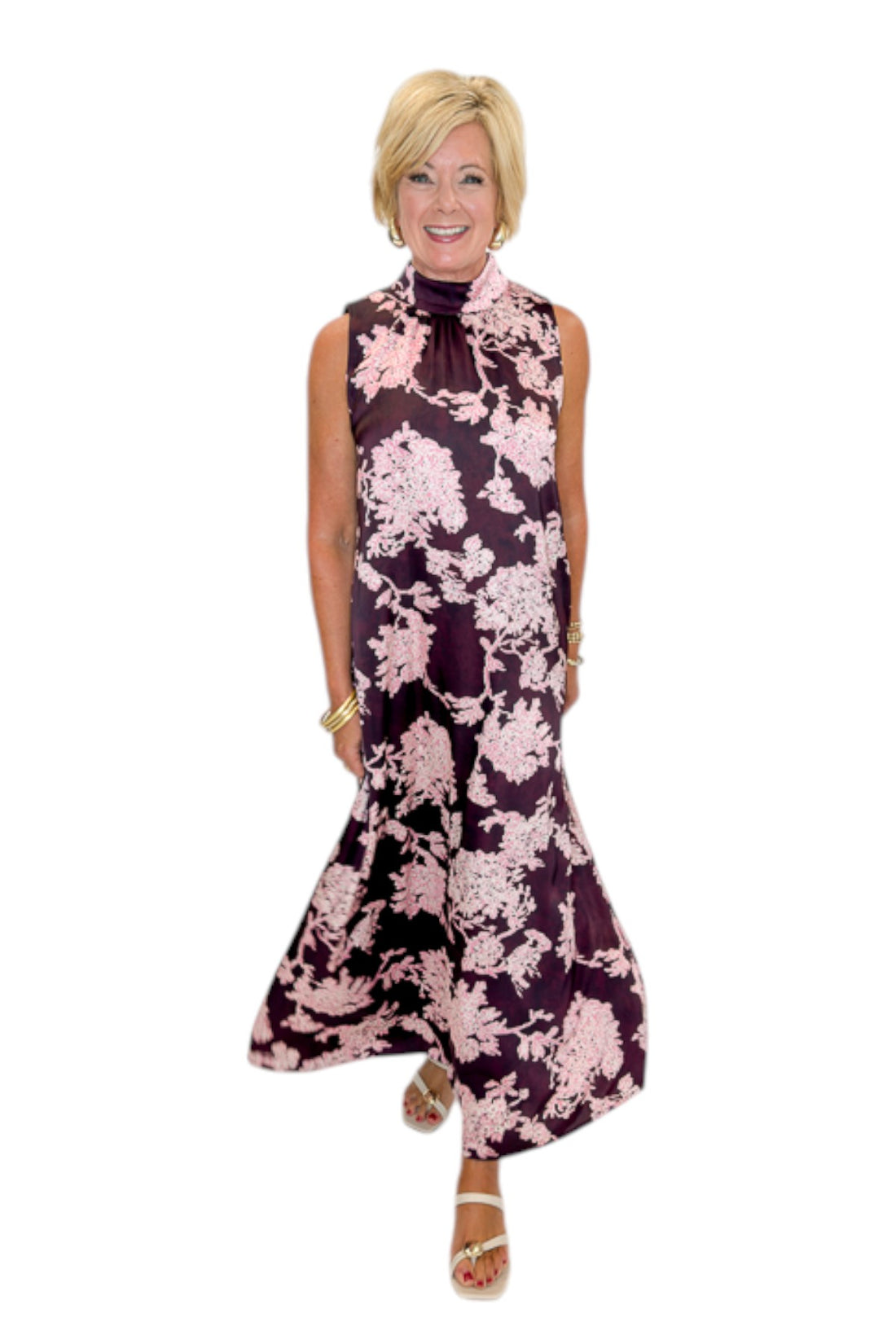Front view of woman wearing Swagger Boutique’s Burgundy &amp; Pink Printed Maxi Dress by Entro with sandals against white studio background.