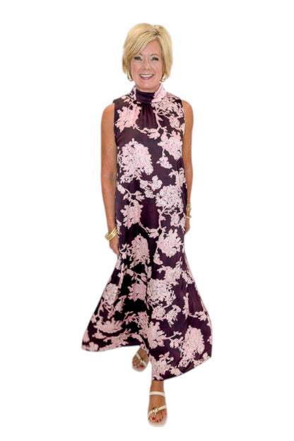 Front view of woman wearing Swagger Boutique’s Burgundy &amp; Pink Printed Maxi Dress by Entro with sandals against white studio background.