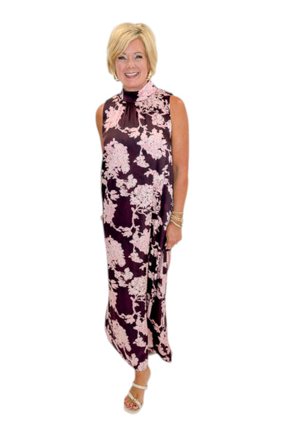 Front view of woman wearing Swagger Boutique’s Burgundy &amp; Pink Printed Maxi Dress by Entro with sandals against white studio background.