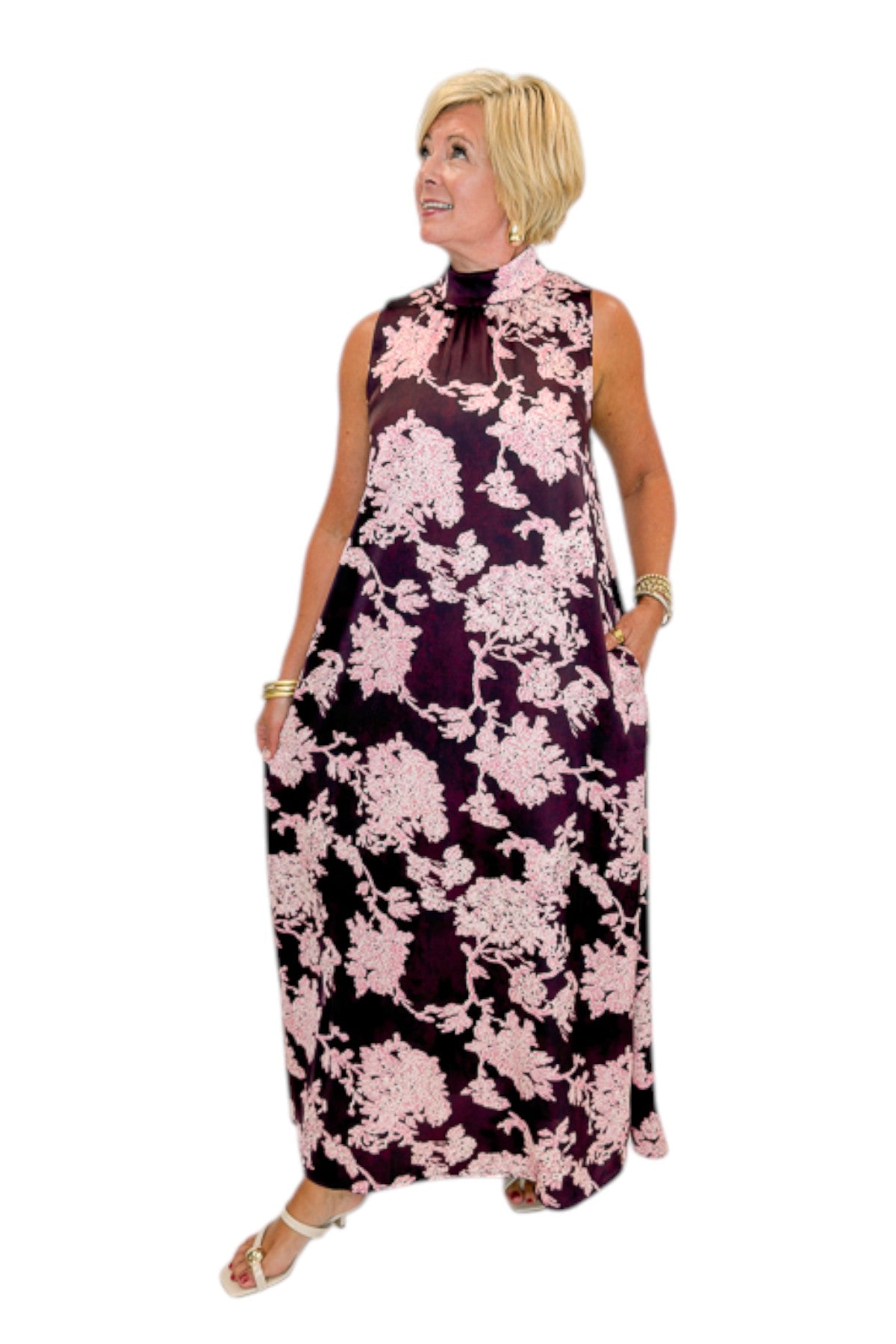 Front view of woman wearing Swagger Boutique’s Burgundy &amp; Pink Printed Maxi Dress by Entro with sandals against white studio background.