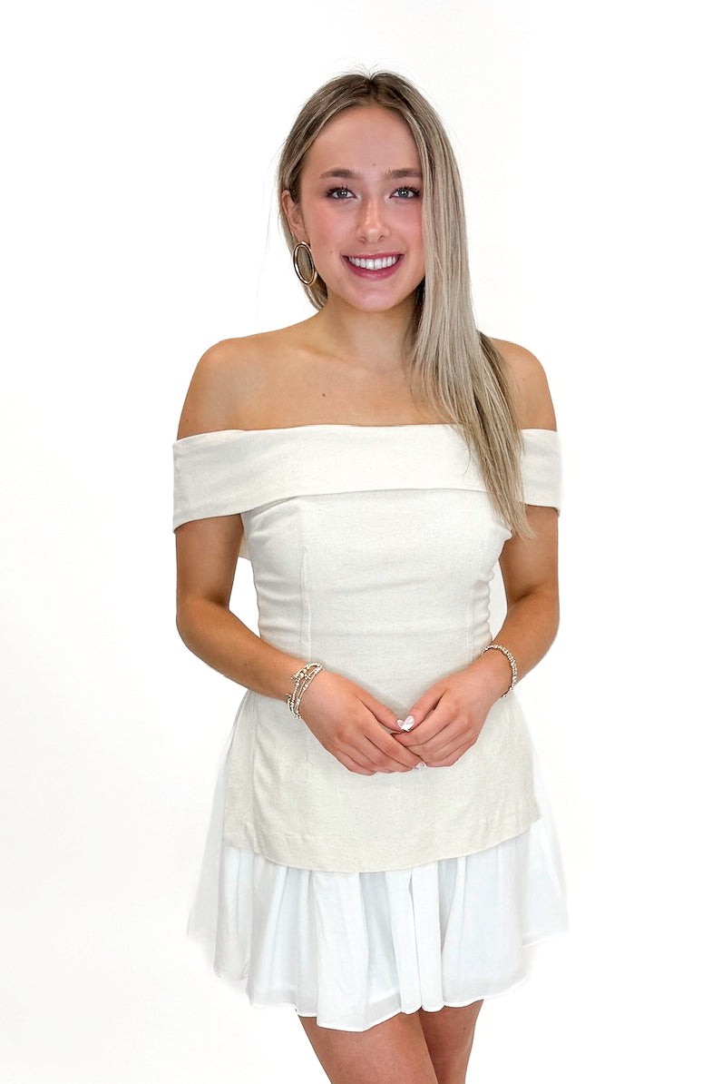Front view of woman wearing Oatmeal Off The Shoulder Layered Dress against white studio background.