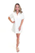 Front view of woman wearing Cream Eyelet Pocket Detail Dress with sandals against white studio background.