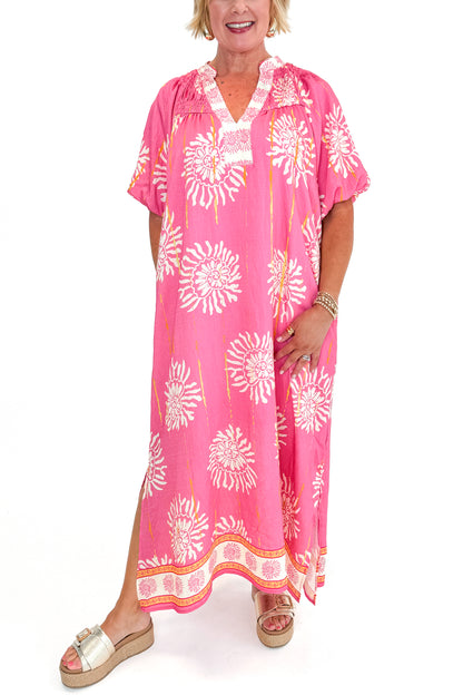 Front view of woman wearing Pink Printed Midi Dress against white studio background.