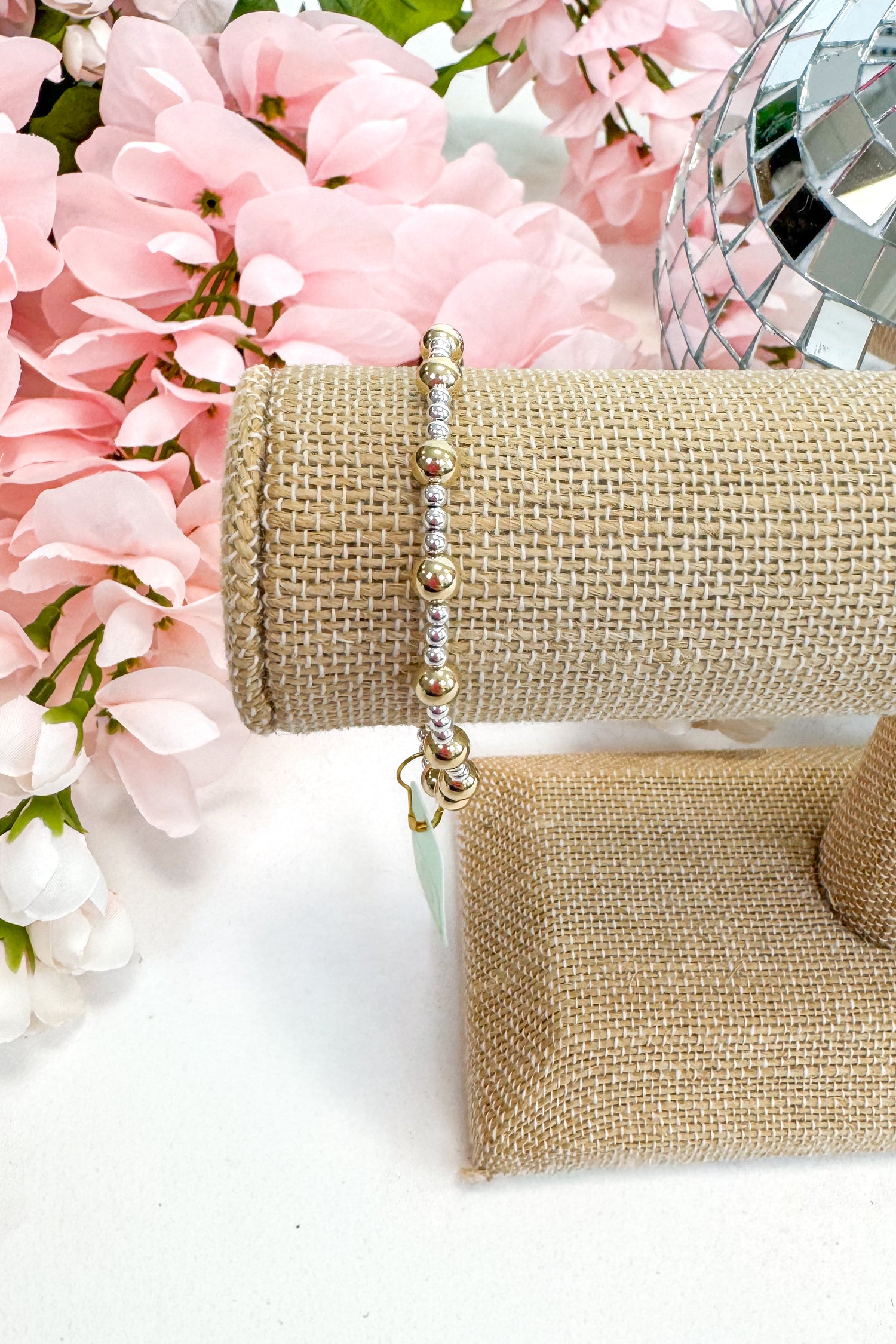 mixed metal enewton bracelet on burlap display