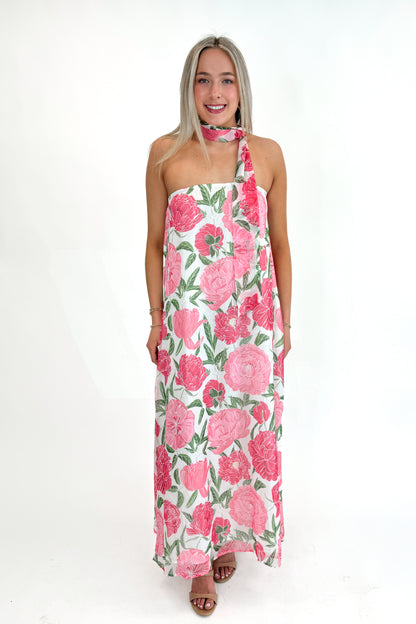 Front view of woman wearing Pink Floral Maxi Dress With Convertible Scarf against white studio background.