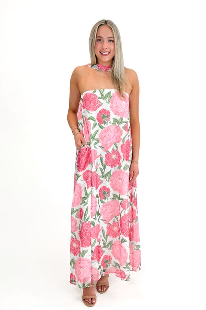 Front view of woman wearing Pink Floral Maxi Dress With Convertible Scarf against white studio background.