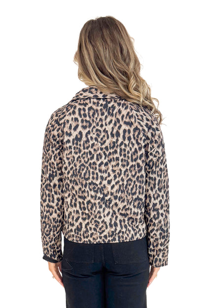 Back photo of woman wearing leopard print quilted jacket with pointed collar and front tie closures