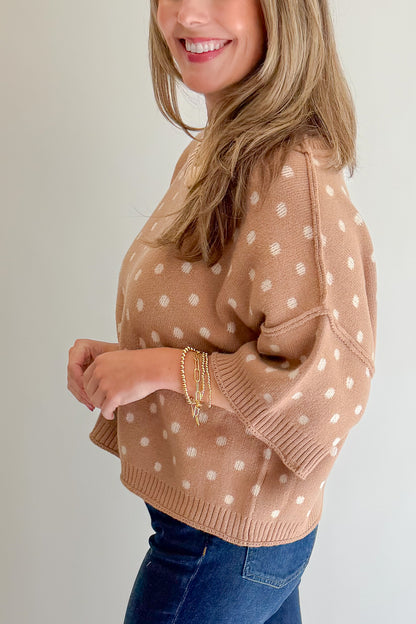 Side detail view of woman wearing Swagger Boutique’s Camel Polka Dot Short Sleeve Sweater by Entro with jeans against white studio background.