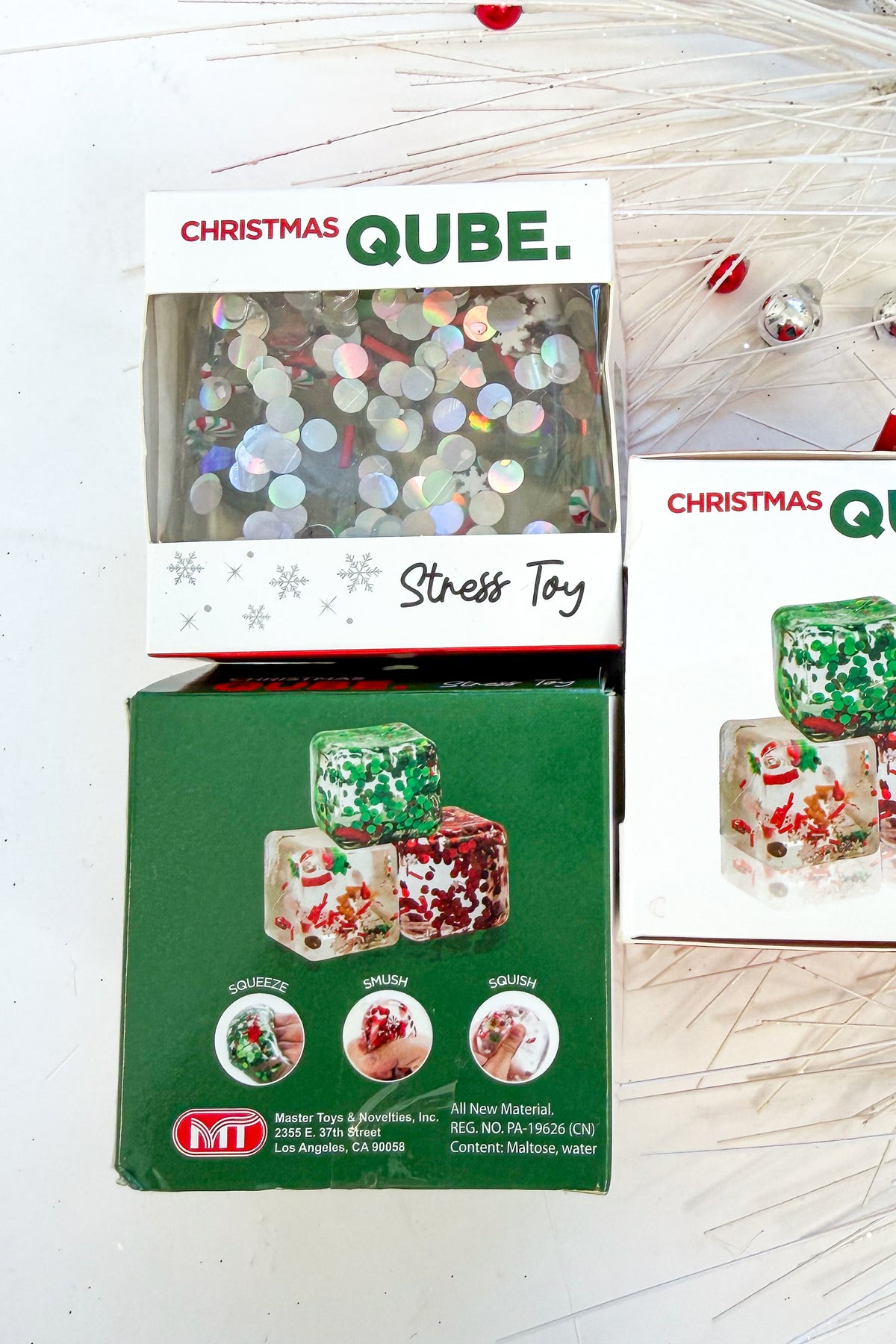 Christmas Qube against holiday background