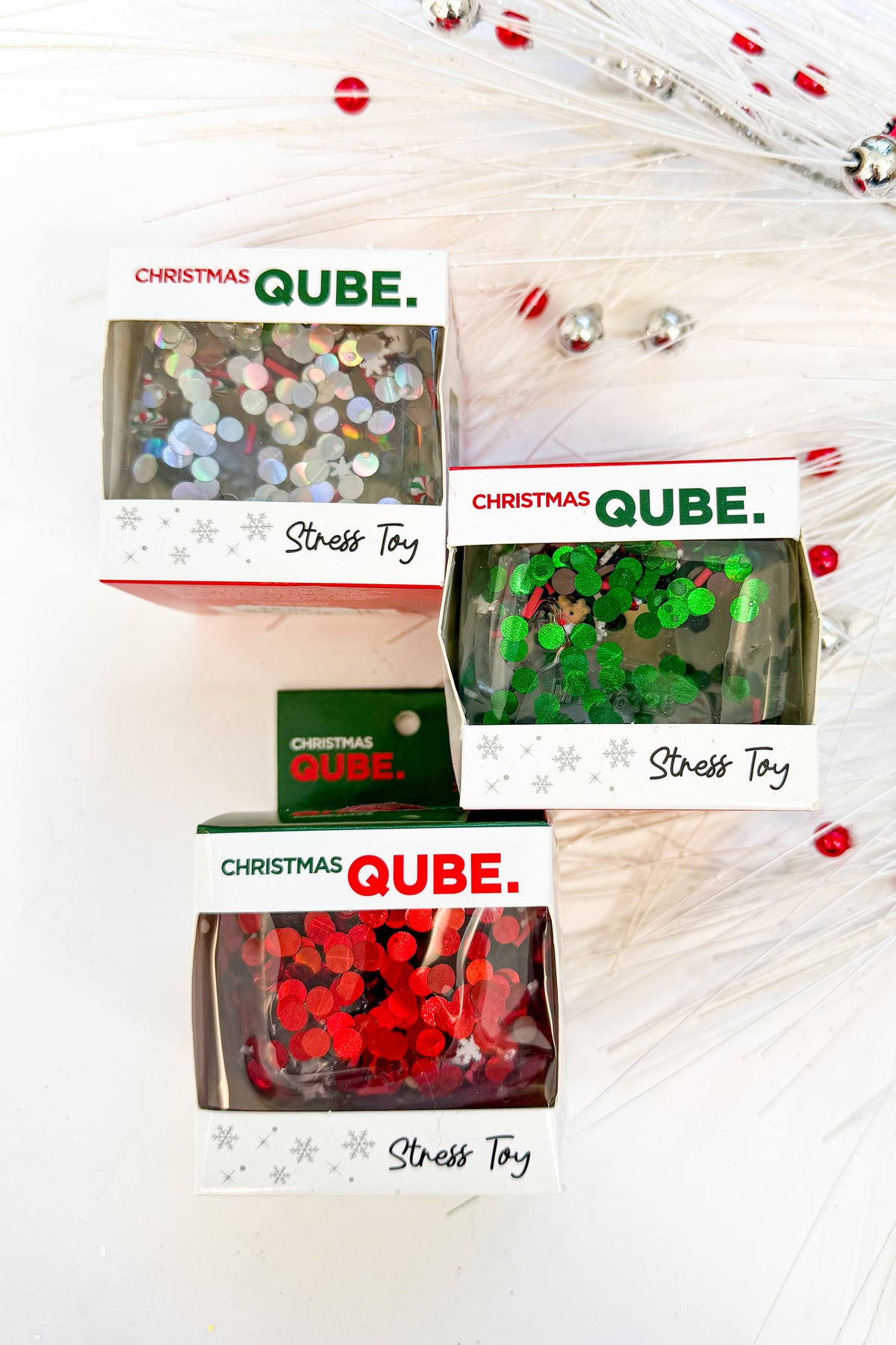 Christmas Qube against holiday background