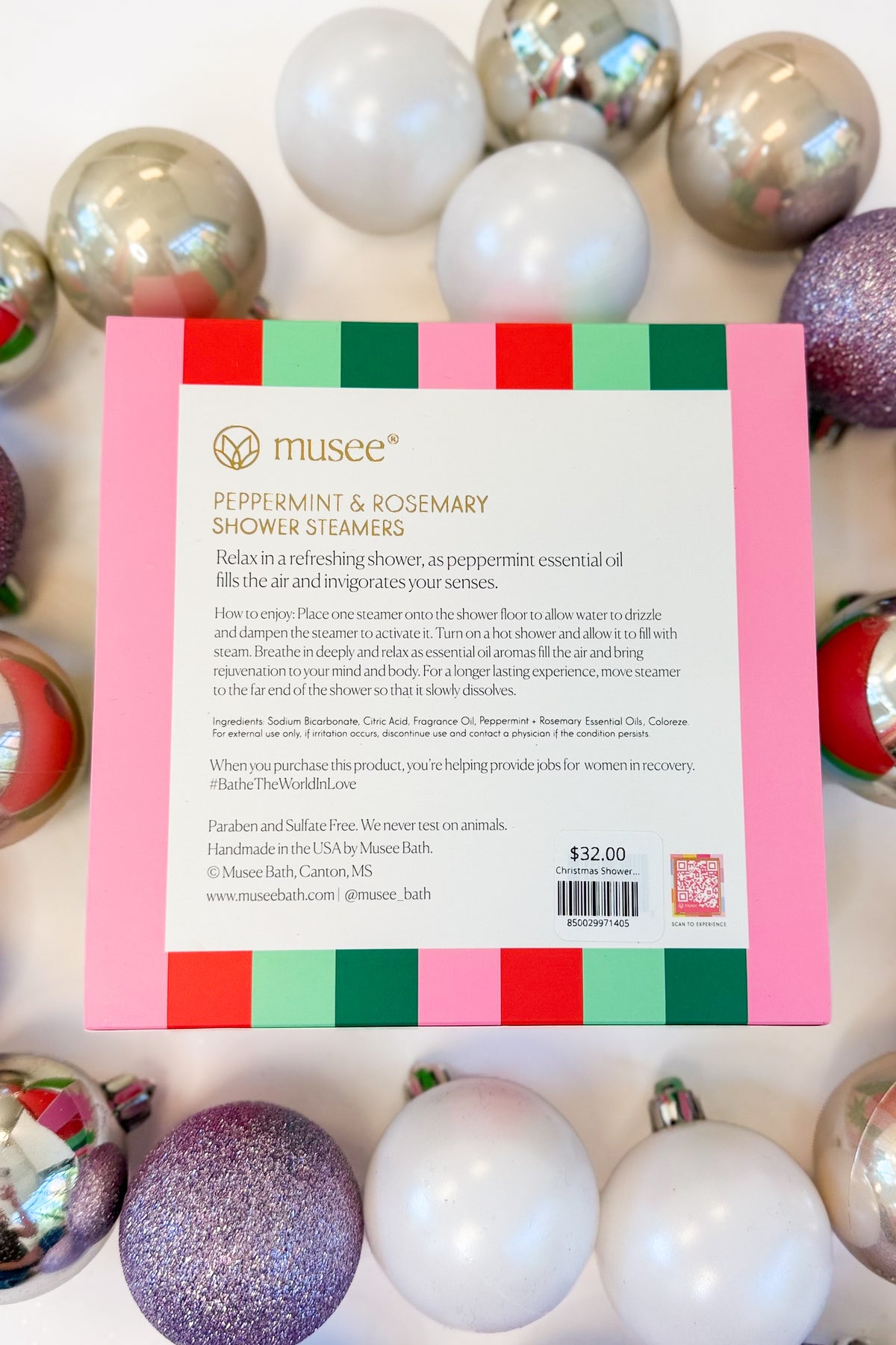 Christmas Shower Steamers against holiday background.