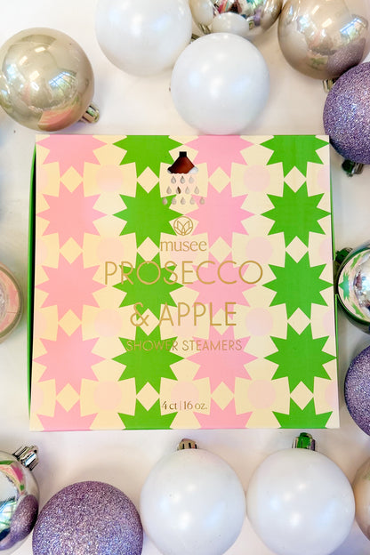 Christmas Shower Steamers against holiday background Prosecco &amp; Apple