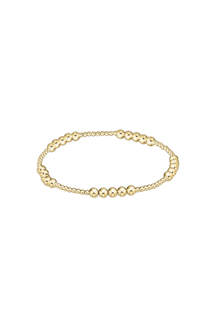 Gold bracelet on a white background