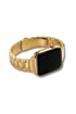 A close-up of a gold-toned smartwatch with a thick chain-link band worn on a person&