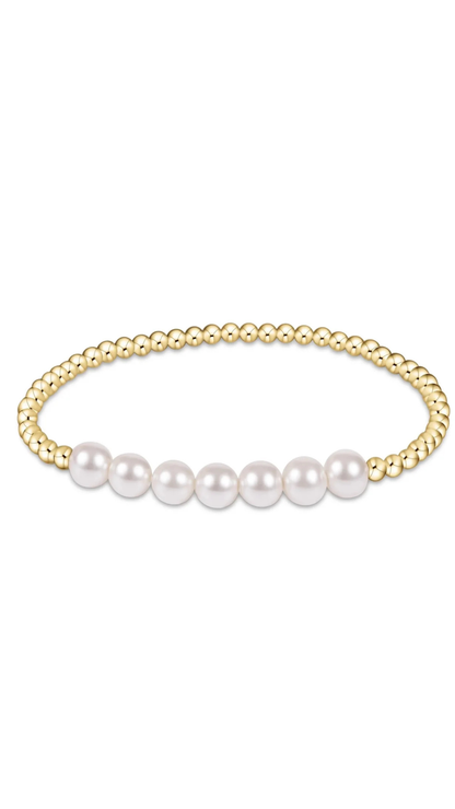 Pearl bracelet on a plain white background